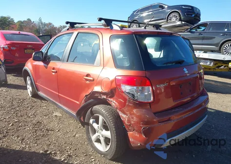 2009 Suzuki Sx4 Technology z USA, uszkodzony, nr VIN JS2YB413X96200669